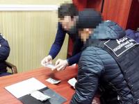 В Одессе задержан автовладелец, предлагавший полицейским 1 тыщу баксов взятки